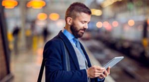 person looking at their tablet